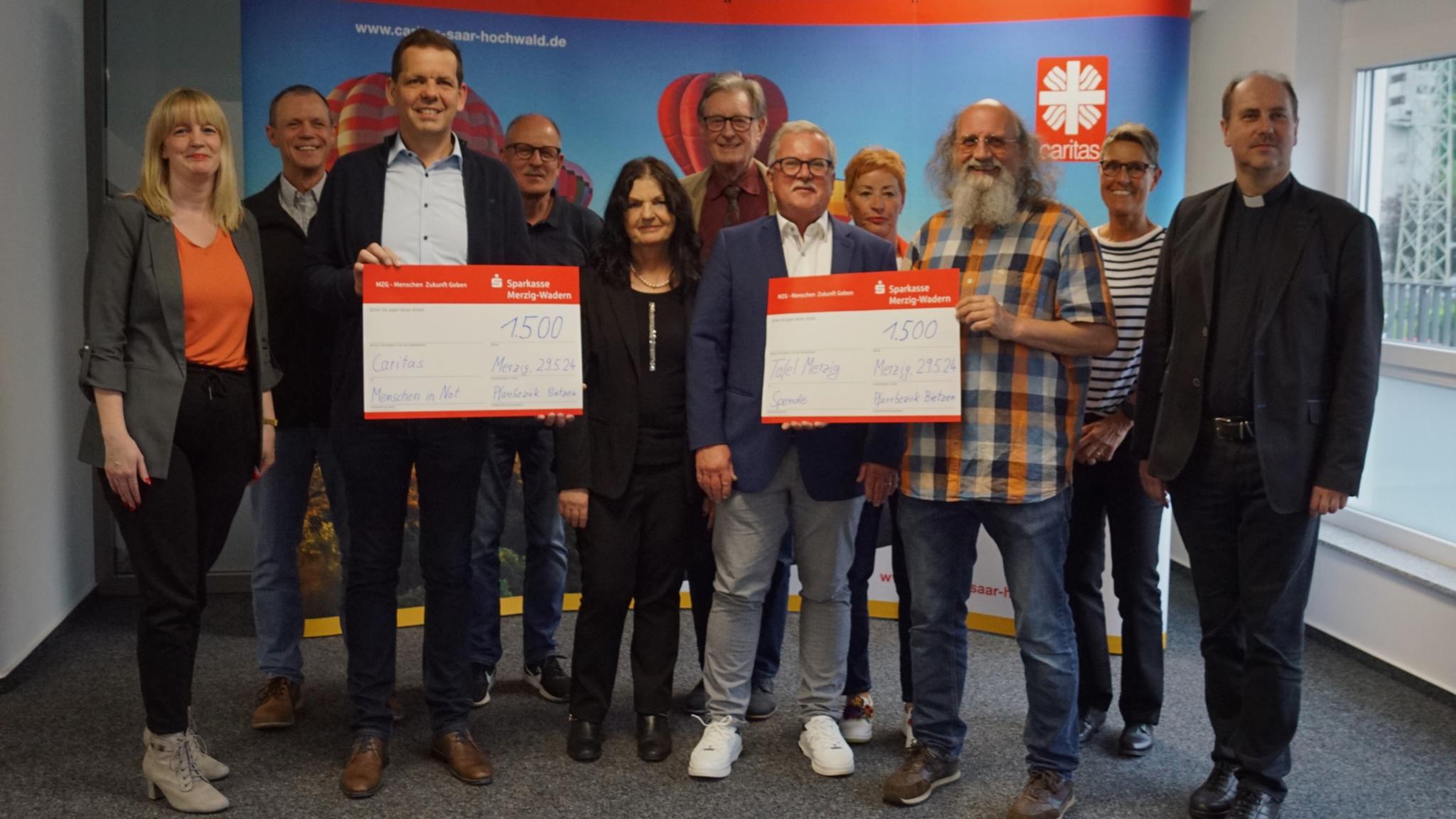 Spendenübergabe an Caritas und  Merziger Tafel