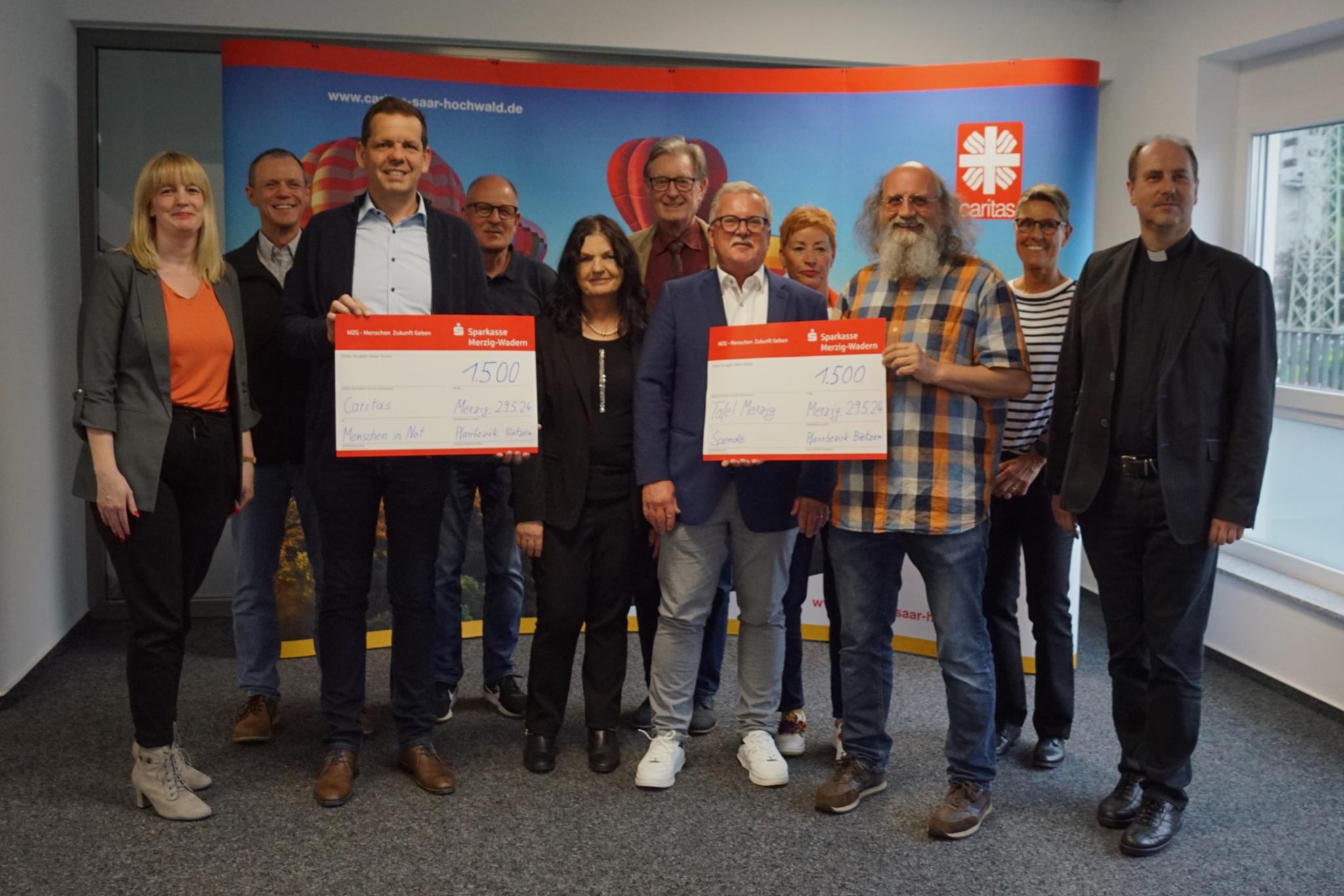 Spendenübergabe an Caritas und  Merziger Tafel
